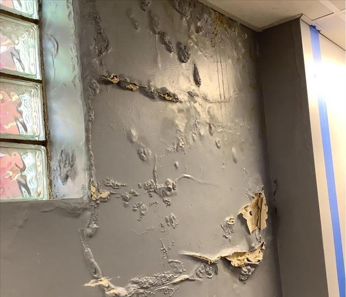 Water damage caused by a foundation leak